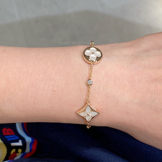 [Clover Jewelery]STAR AND SUN 4 MOTIF WHITE MOP PINK GOLD BRACELET