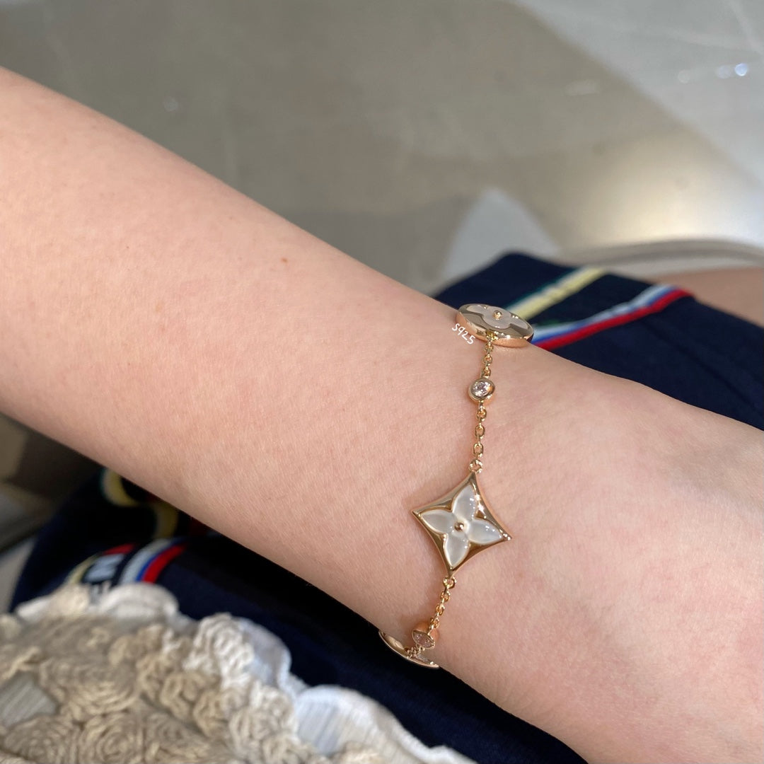 [Clover Jewelery]STAR AND SUN 4 MOTIF WHITE MOP PINK GOLD BRACELET